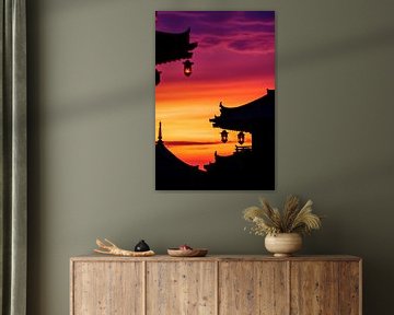 Zonsondergang over pagodes van Poster Art Shop