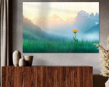 Blooming flower in front of a mountain landscape by Poster Art Shop