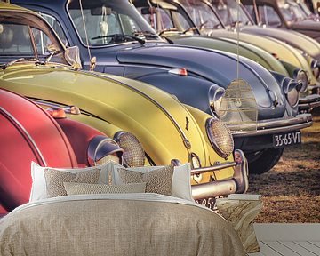 Row of classic Volkswagen Beetles by Martin Bergsma