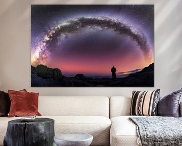 Sterrenhemel boven een rotsachtig landschap van Poster Art Shop