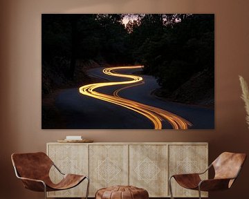 Winding road with light trails by Poster Art Shop
