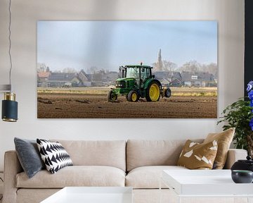 Agriculture in Action: John Deere Tractor in the Field by Triki Photography