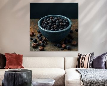 blackcurrants in stone bowl still life. by J.a Dijkstra