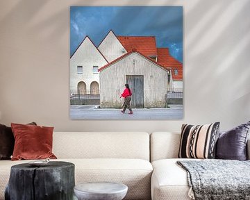 Houses in the French seaside resort of Wissant with a single walker in the foreground by Harrie Muis