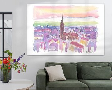 Freiburger Münster bei Sonnenuntergang in leuchtenden Stadtbildfarben