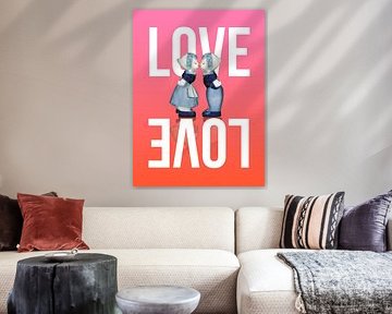 LOVE - Delft blue kissing couple. People on pink background
