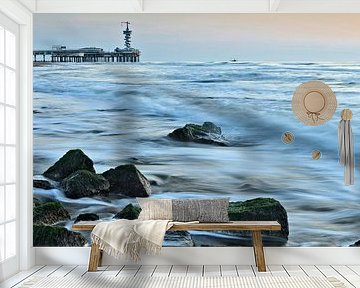 Scheveningen Pier with the rocks of a breakwater in the surf by gaps photography