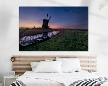 boat at schermerhorn with the windmills by peterheinspictures