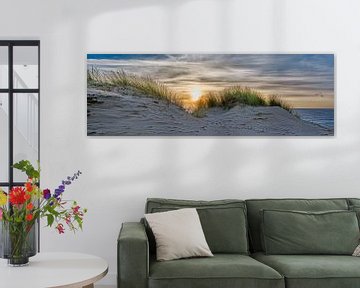 Kust met duin strand en Noordzee bij zonsondergang van eric van der eijk