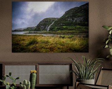 Waterfall at Hunnevatn: rugged splendour with dark clouds
