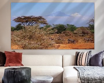 Zebras in front of Kilimanjaro in Tsavo West national park in Kenya by Aagje de Jong