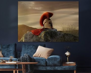 Casque grec antique de Sparte avec cape rouge, couché sur un rocher