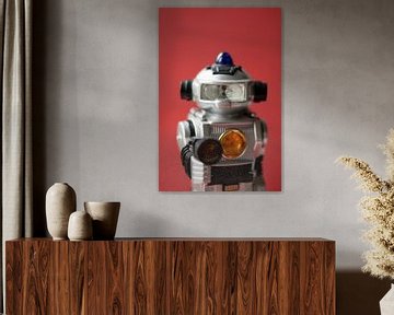 red background with a vintage mettalic robot cop