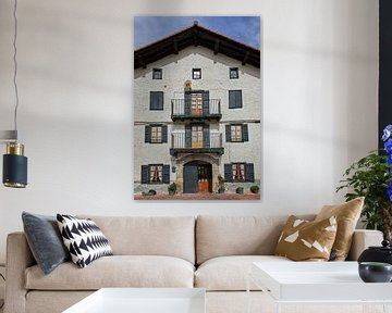 Façade with old satellite dish and modern door behind century-old entrance by Ton Van Zeijl