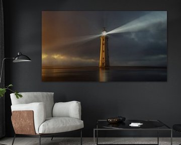 vuurtoren bij zonsondergang met lichtstralen van Markus Gann