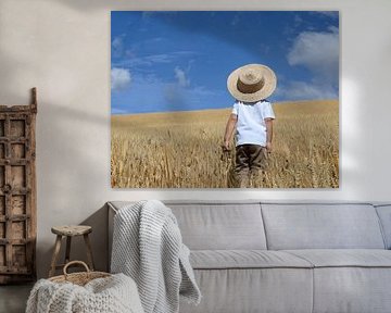 A child in an oat field