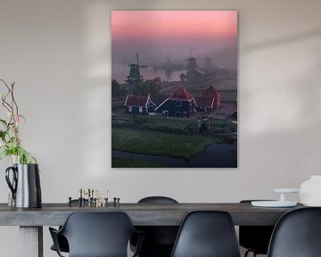 Zaanse Schans: Historic Windmills at Sunrise in the Mist by Ewold Kooistra