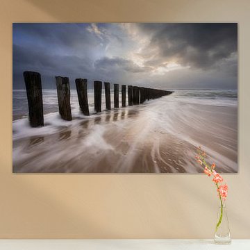 Sea moves past breakwater by Thom Brouwer