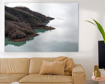 Mountain in lake by Werner Lerooy