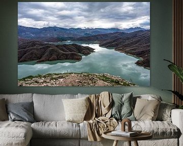 Mountainous landscape over reservoir lake by Werner Lerooy