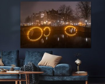 Amsterdam's Canal Belt in fog in the evening