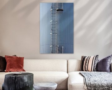 Silver blue silo with steel ladder by Jan Brons