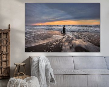 Tide at sunset at the beach by peterheinspictures