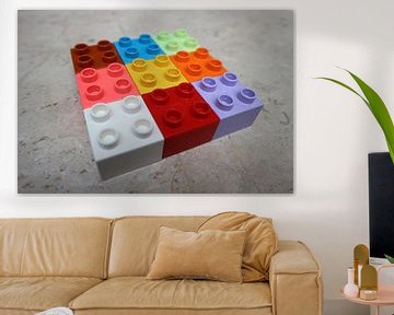 Nine (9) square toy blocks lying colourful (rotation 1)