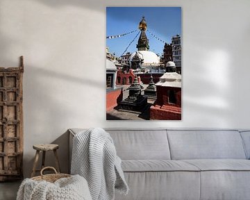 Buddhist stupa surrounded by urban life by Frank Photos