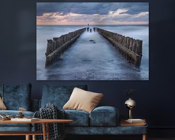 dark skies over the breakwater in Westkapelle by conny de visser