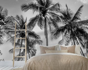 Palm trees in a Timeless Tropical Sky in Black and White by Femke Ketelaar