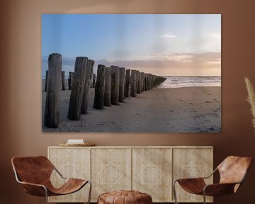 Posts in the sand by Hendrik Karremans