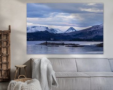 Mountains and rocks in winter near Torvik in Norway by Rico Ködder