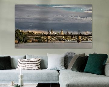 The Spanish city of Seville in the softly coloured evening light by Harrie Muis