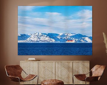 Mountains, rocks and ships in winter near Hammerfest in Norway by Rico Ködder