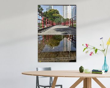 A footbridge to the city park by Claude Laprise