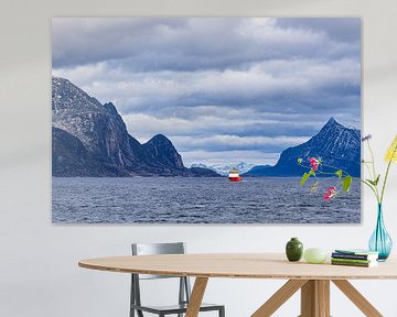 Mountains, rocks and ship in winter near Ørnes in Norway by Rico Ködder