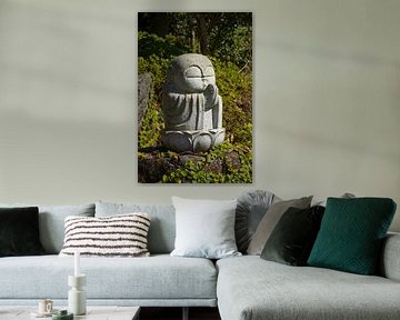 Japanese ancient historic stone Buddha statue in park by Frans Rombout