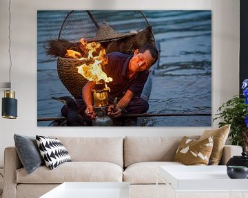 Aalscholvervisser met brander van Joop Luimes