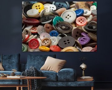 Collection of different sizes and colours of plastic buttons by Frans Rombout