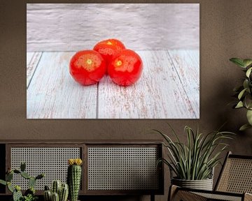 Washed cherry tomatoes with water drops by Marco Theunissen