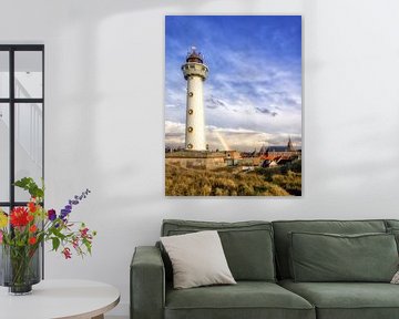 Regenboog achter vuurtoren Egmond aan Zee