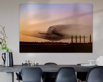 Spreeuwen tijdens zonsondergang aan het einde van een winterdag van Sjoerd van der Wal Fotografie