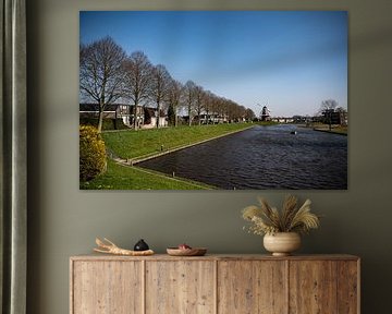 Mühle De Hoop in Dokkum: Eine ikonische Aussicht über die Grachten von Zuidfotograaf