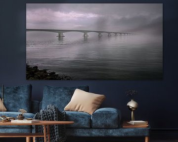 De Zeelandbrug met wolken en mist van Jan Jongejan