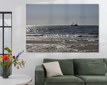 North Sea beach with fishing boat. by Wim Jacobs