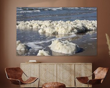 North Sea beach with sea foam. by Wim Jacobs