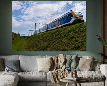 Train on the dyke in Steenwijk. by Brian Morgan