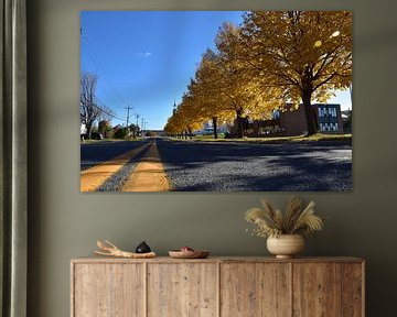 The village street in autumn by Claude Laprise