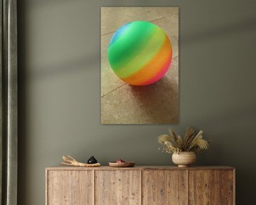 Toy ball against light background